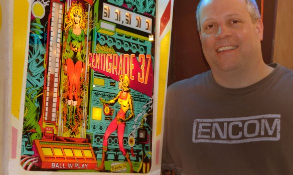 ed beeler with pinball game